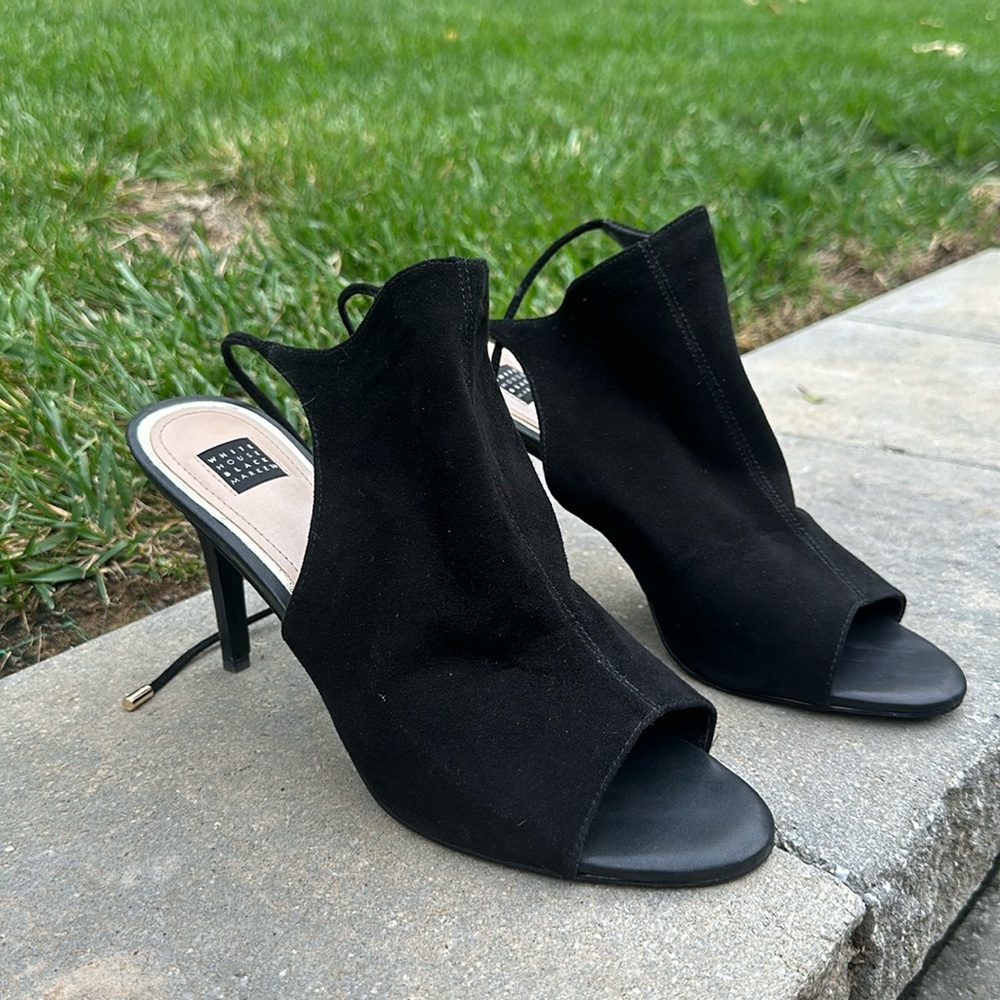 Black high heels with a tie in back